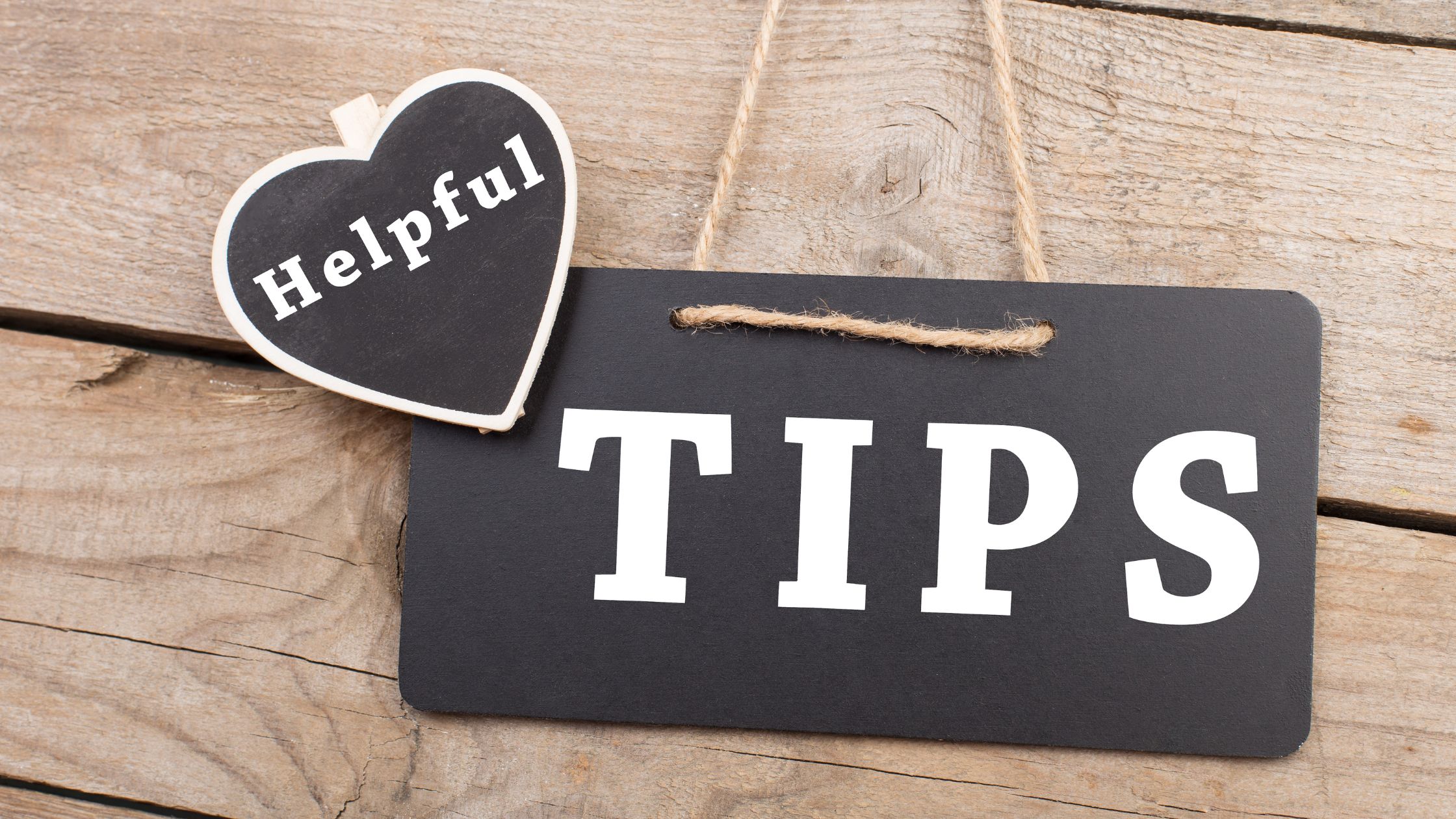 Wooden door sign with the words, 'helpful tips', symbolizing practical advice.